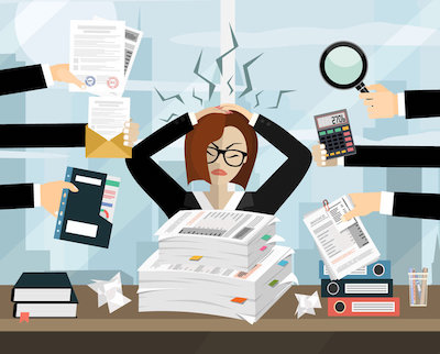 Person overwhelmed with work