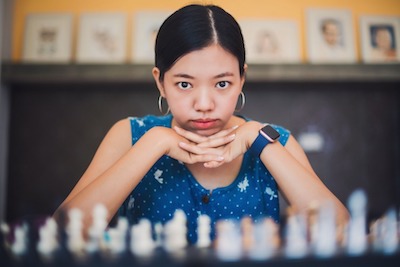 Woman playing chess